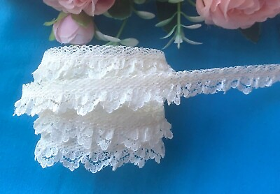 #ad Ruffled Lace 5 8 inch wide ivory or white color price per yard $1.49