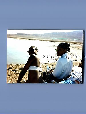 #ad FOUND COLOR PHOTO P0492 PRETTY BLACK WOMAN FROM BEHIND LOOKING BACKMAN BESIDE $6.98